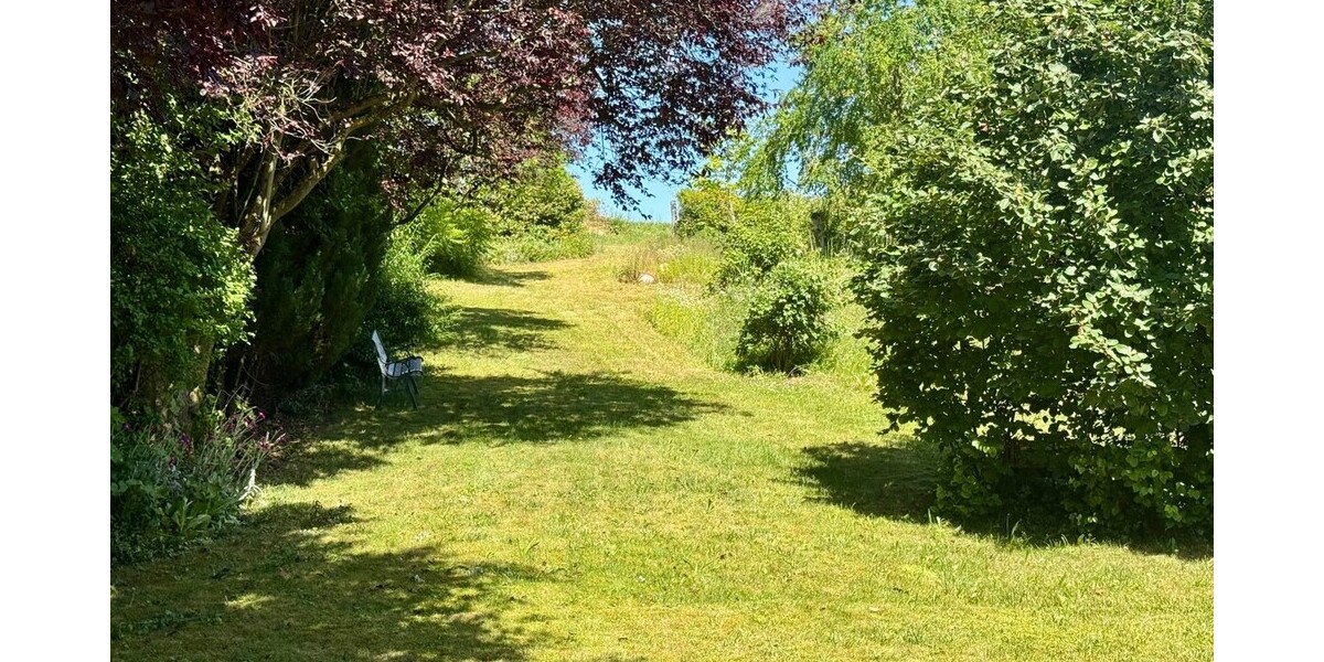 HORN IMMOBILIEN + Einfamilienhaus im Bungalowstil mit parkähnlichem Grundst. 5 km bis Neubrandenburg - Einfamilienhaus Burg Stargard | Angebot:27013653