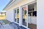 HORN IMMOBILIEN ++ Winkelbungalow 5 km bis Neubrandenburg, Baujahr 2022, Doppelgarage + Carport - Einfamilienhaus Sponholz | Angebot:23673755